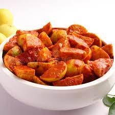 Traditional Andhra Nimakaya Pachadi made with fresh lemons and spices”