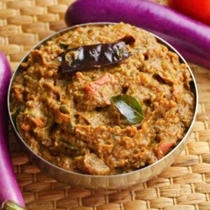 Homemade South Indian vankaya pickle with garlic and spices